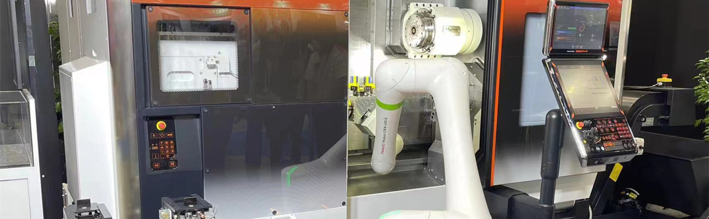 Precision CNC turning machine operated by automation robot Automatic robot operating CNC turning machine for precision components